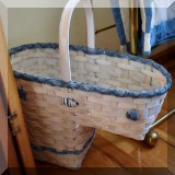D14. Steps basket with shell decorations.